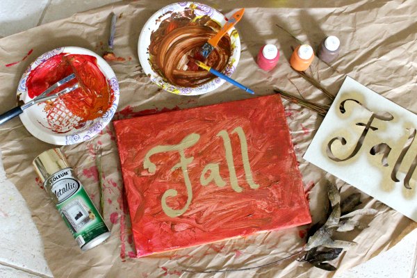 Adult completes Toddler FALL painitng project with metallic gold spray paint
