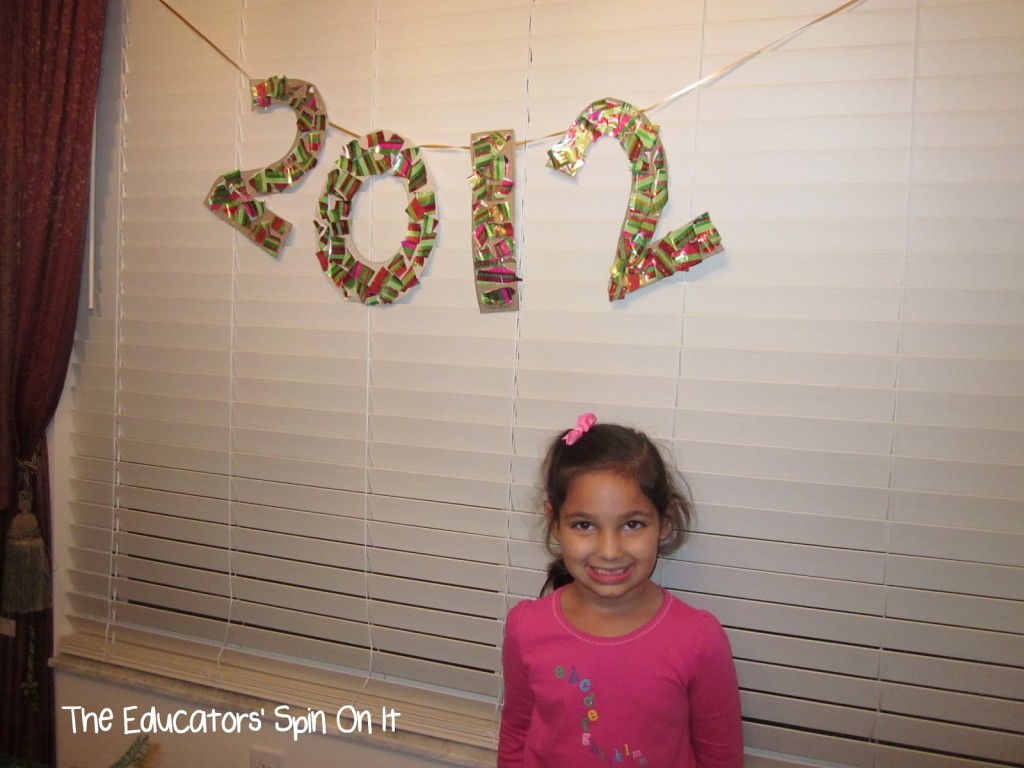 New Year's Sign with Recycled Cardboard and Wrapping Paper 