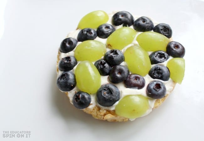 Healthy Earth Day Fruit Snack for Kids with Grapes and Blueberries on Rice Cake 