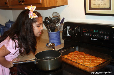 Looking at baked Baklava to see if it's time to put syrup on top of it. 