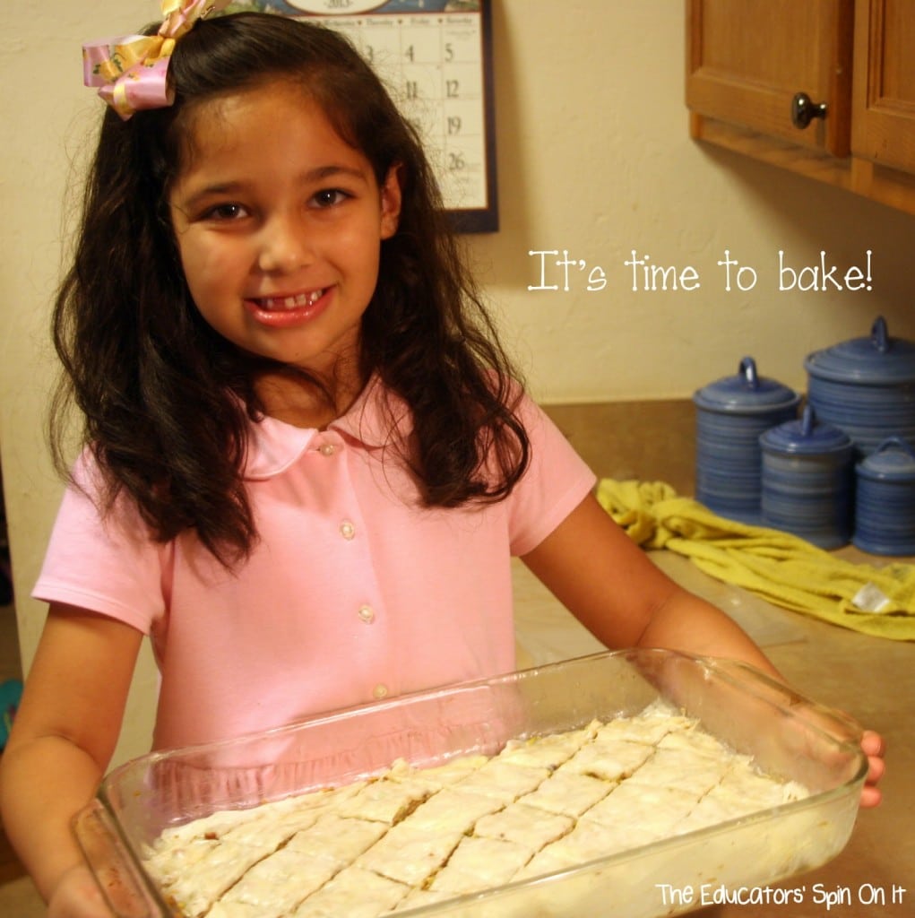 Getting ready to put cut baklava into oven to bake. A fun cooking lesson about Greece for kids