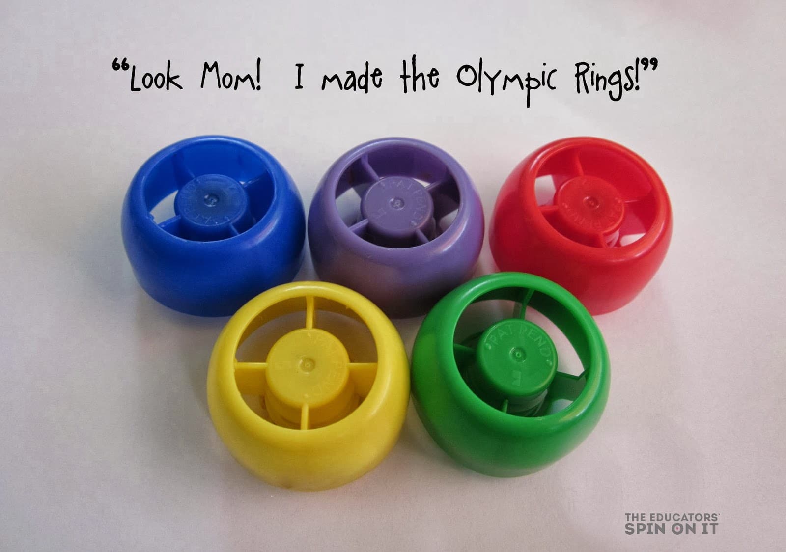 Create the Olympic rings with recycled circular items 
