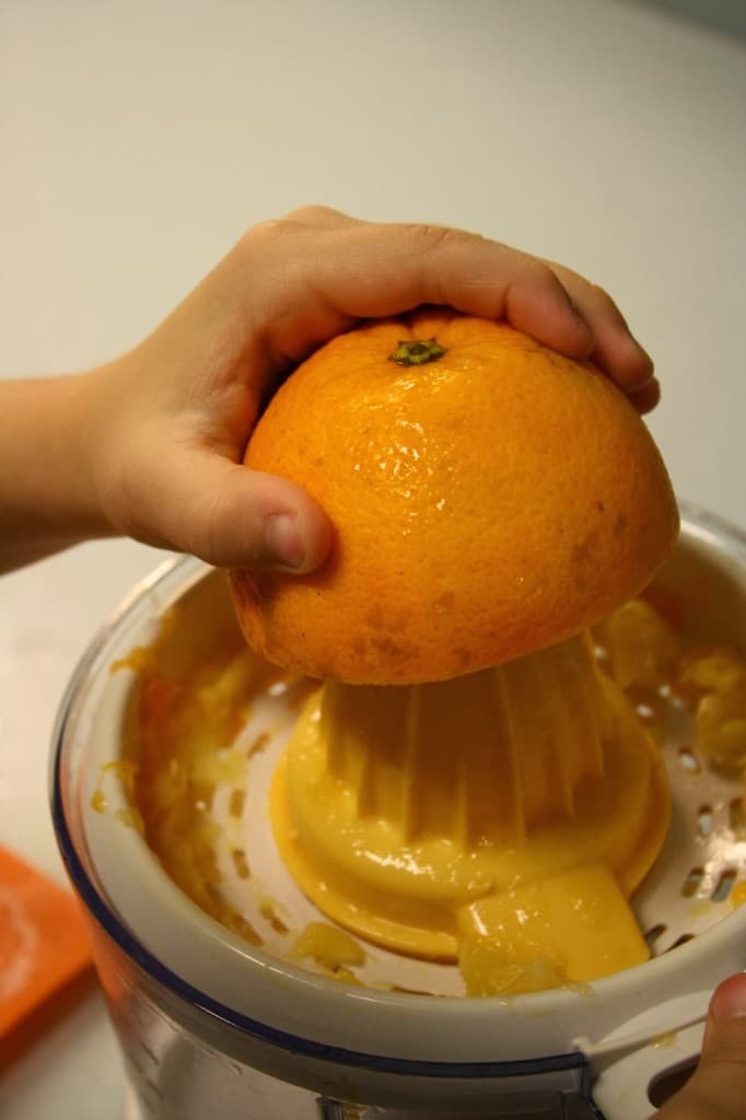 Juicing oranges with kids