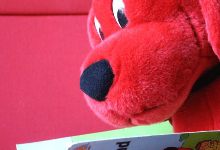 Clifford reading book to inspire Clifford Games for Kids