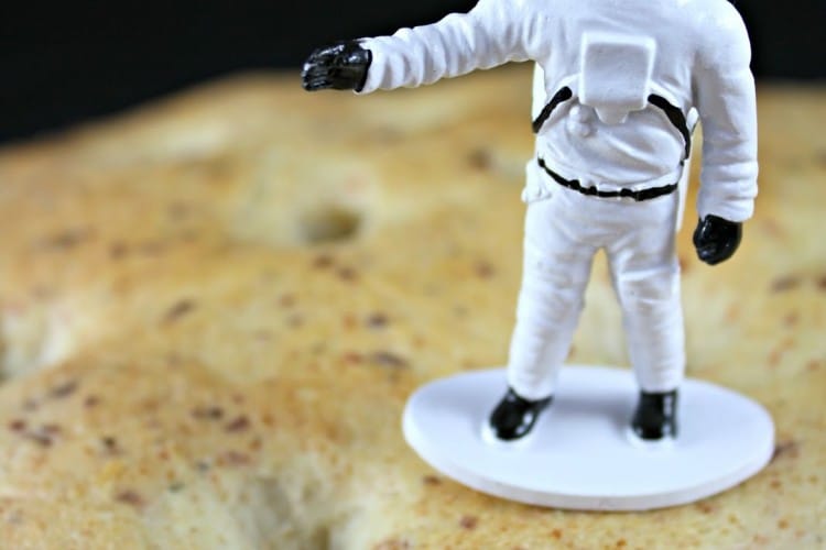 Close up of Moon Bread Recipe and Astronaut Toy