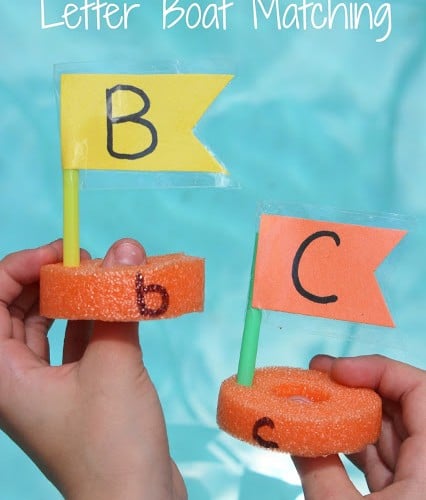 Boats made with Pool Noodles, straws and paper with letters