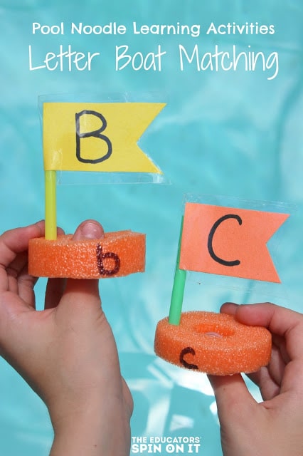 Boats made with Pool Noodles, straws and paper with letters