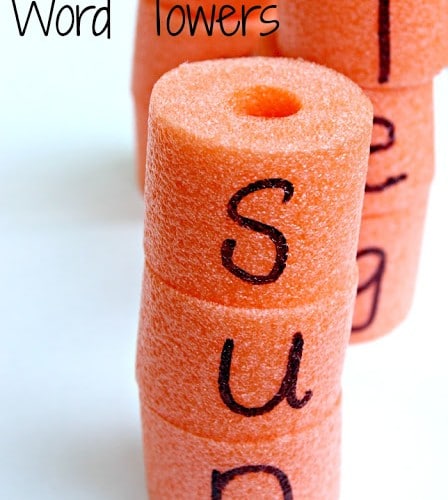 letters written on pool noodles to create a word tower