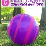 Large Purple Ball with hot pink stripes on grass with ball games for kids featured