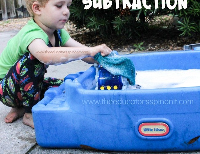 Car Wash Subtraction: Child having fun washing cars and learning math outdoors