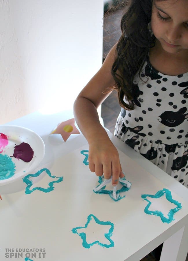 Kids Painting with Star Shaped Stamps