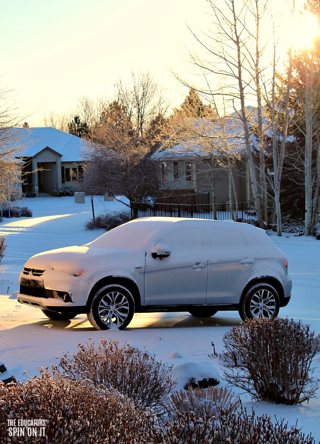 Sunrise over snow covered Mitsubishi Outlander Sport 2.4 Review by Kim Vij