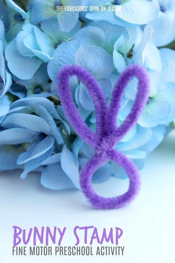 Pipe Cleaner in shape of rabbit head in front of spring hydrangea flowers