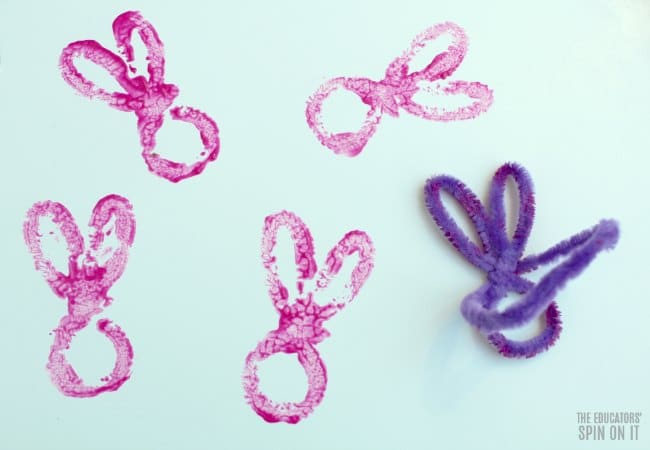 Pink paint outline of rabbit from bunny outline with pipe cleaner for Kids