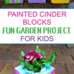 Painted Cinder Blocks with flowering plant planted inside created by kids