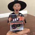 Boy with Witch Hat Holding Printable Halloween ebook for Preschoolers and Toddlers with Activities & Books