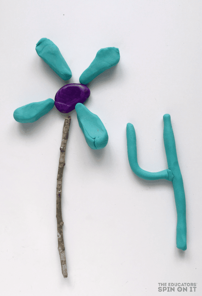 Playdough flower with rock and numbers