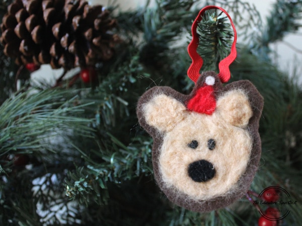 Adorable kid made felted bear ornament idea using wool and felt to hang on christmas tree.