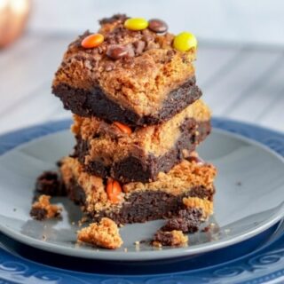Pumpkin Peanut Butter Brownies stacked 3 on plate