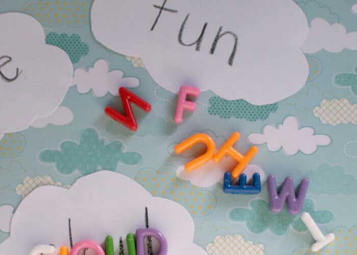 ABC Beads on cloud cutouts to create sight word game for kids.