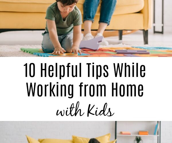 Child playing with parents in working on laptop on sofa