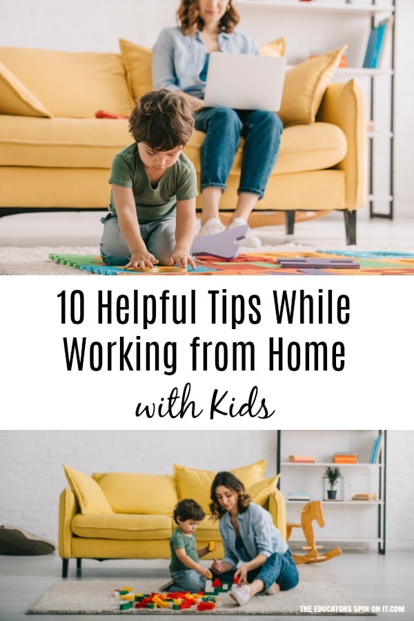 Child playing with parents in working on laptop on sofa