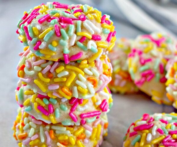 Stacked sugar cookies with sprinkles made with cream cheese