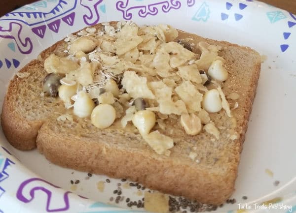 Bread with edible items to represent sedimentary Rocks