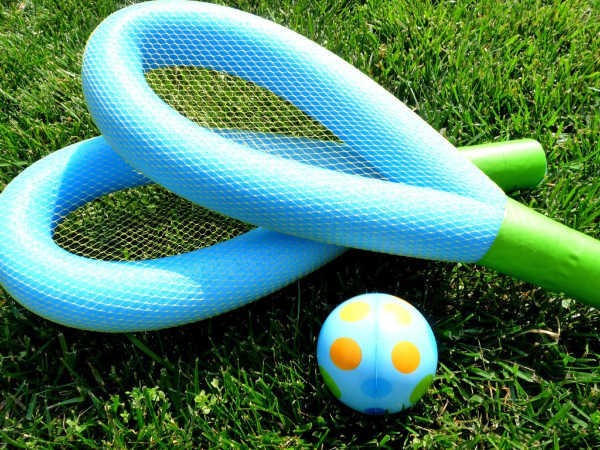 playing tennis with homemade pool noodle rackets