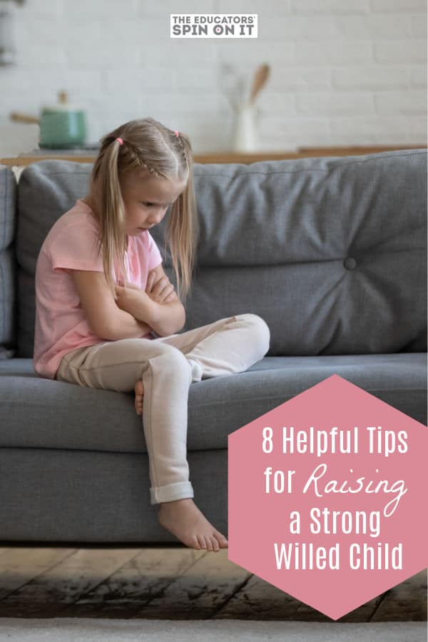 parenting a strong willed child sitting on a sofa with arms crossed upset