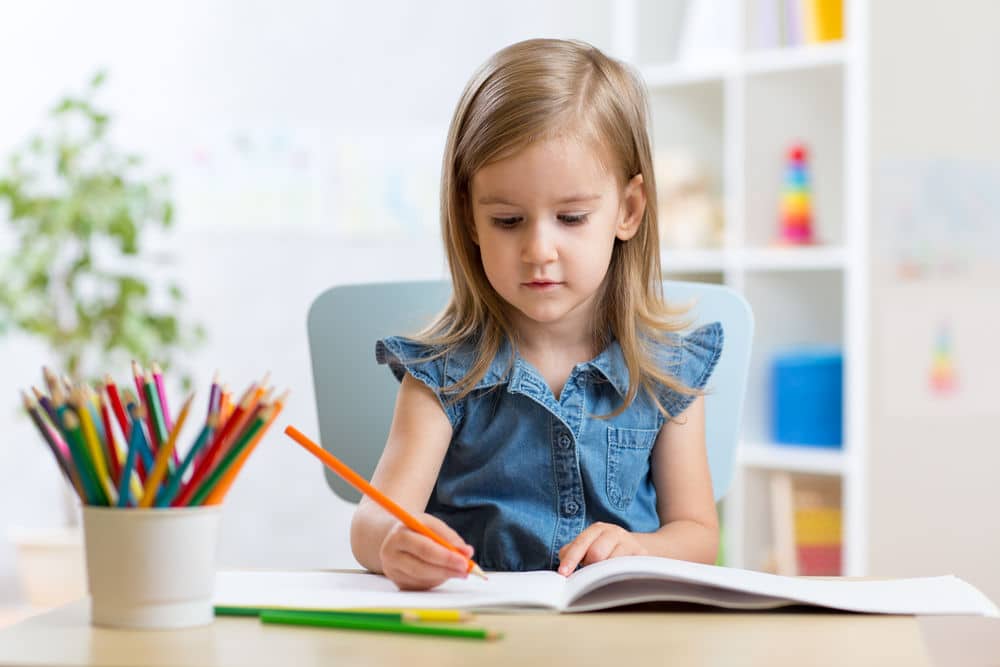 preschool child learning at home