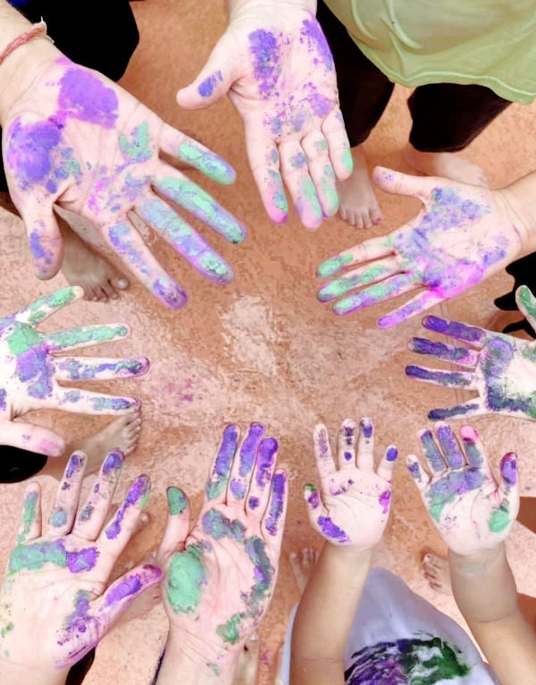 Holi power on hands to celebrate Hindu festival of colors