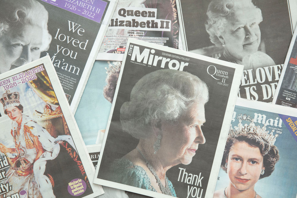LONDON, UK - September 2022: Front covers of national newspapers pay tribute to the Queen after her death.