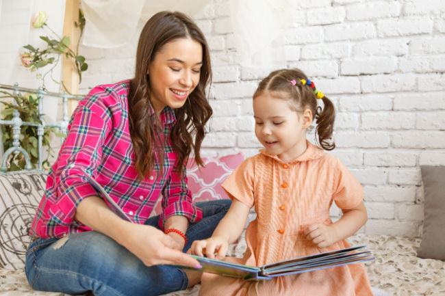 Mother reading with child