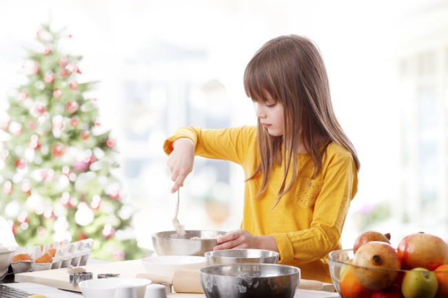 Child Making Christmas Recipes for the Holiday Season