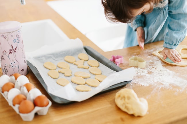 Child making Easter cookies